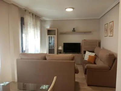 Zona de estar de PLAZA AYUNTAMIENTO 3 HaBITACIONES B&A