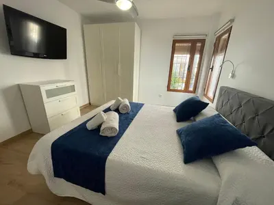 Cama o camas de una habitación en CENTRO - Patio Andaluz San Pablo - PARKING GRATIS- WIFI