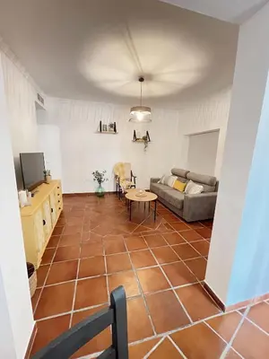 Una televisión o centro de entretenimiento en Apartamento Potro 1