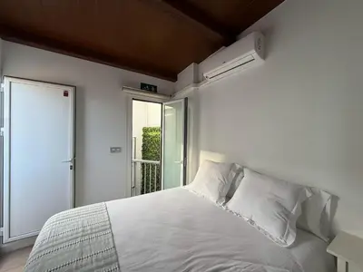 Cama o camas de una habitación en Dúplex Masset