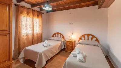 Cama o camas de una habitación en Casa Mis Niñas Casabermeja by Ruralidays