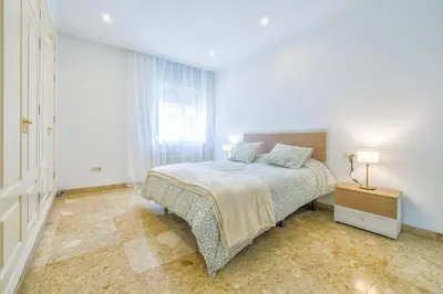 Cama o camas de una habitación en Apto Cruz Conde Center