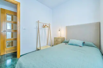 Cama o camas de una habitación en Apto Ronda de los Tejares & Centro