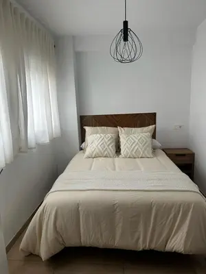 Cama o camas de una habitación en Apartamentos RoMar Campillos