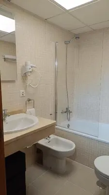 Un baño de Las 4 Llaves