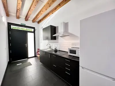 Una cocina o zona de cocina en Feria Apartments