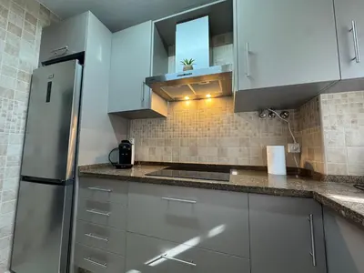 Una cocina o zona de cocina en Apartamento Centro Puente Romano