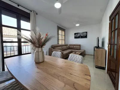 Una televisión o centro de entretenimiento en Apartamento Centro Puente Romano