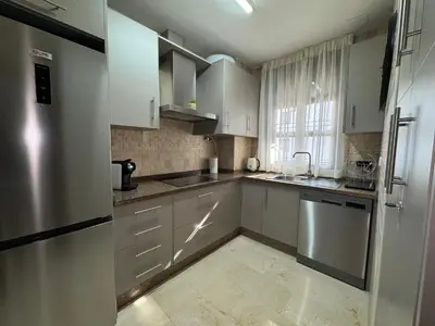 Una cocina o zona de cocina en Apartamento Centro Puente Romano