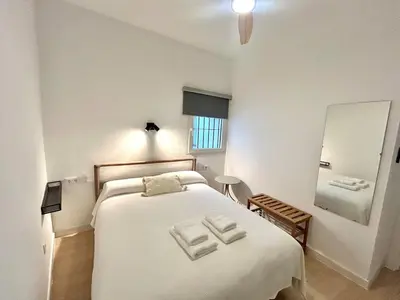 Cama o camas de una habitación en Nuevo! Acogedor apt 8pax 4Bdr 2Bth - CozyHomeSevilla4