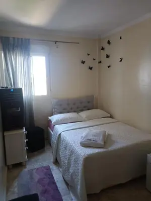 Cama o camas de una habitación en bonita habitación el apartamento compartido con todas las comodidades se sentirán como muy bien