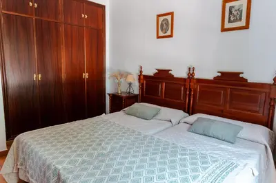 Cama o camas de una habitación en Bungalows Los Álamos de El Pedroso