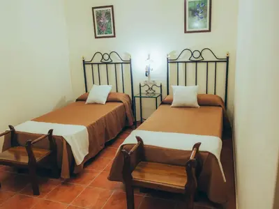 Cama o camas de una habitación en Apartamentos Molino Almona HC