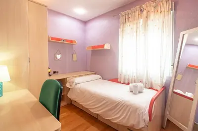 Cama o camas de una habitación en Geysotur Mirador de la Calahorra