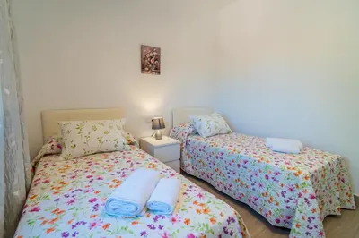 Cama o camas de una habitación en Casa Rural Olivera