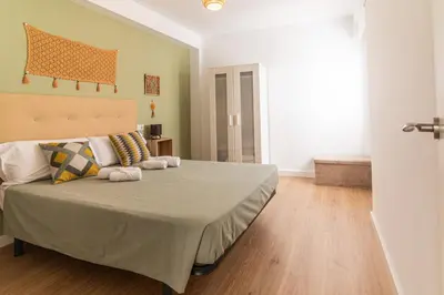 Cama o camas de una habitación en El Rincón de la Muralla