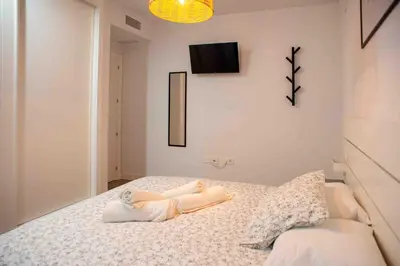 Cama o camas de una habitación en Precioso apartamento para rest work and enjoy en Cordoba Centro 5B