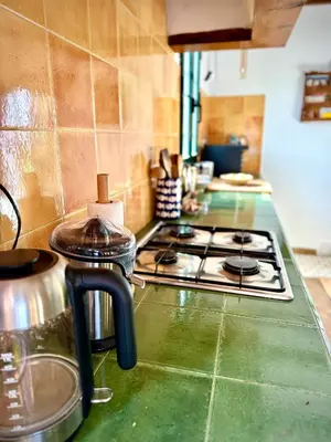 Una cocina o zona de cocina en Romantische Finca nahe Málaga, kreativ einzigartig