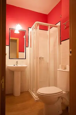 Un baño de Macarena Flat
