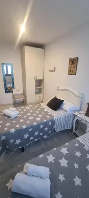 Cama o camas de una habitación en Casa Rave 17