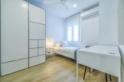 Cama o camas de una habitación en El Oasis de San Lorenzo