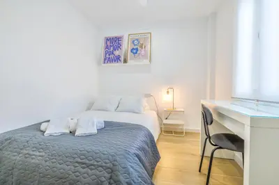 Cama o camas de una habitación en El Oasis de San Lorenzo