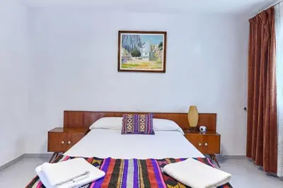 Cama o camas de una habitación en la encina