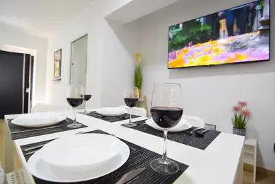 Una televisión o centro de entretenimiento en BAJO 23 con FACIL APARCAMIENTO