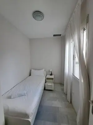 Cama o camas de una habitación en Selecta Apto con dos dormitorios en patio tradicional