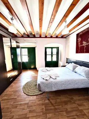 Cama o camas de una habitación en Casa en La Corredera