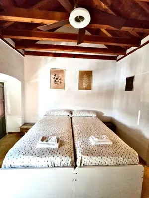 Cama o camas de una habitación en Casa en La Corredera