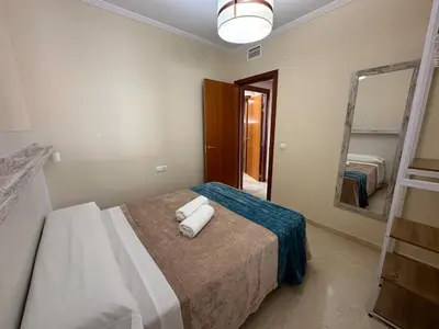 Cama o camas de una habitación en Piso en Linares zona Paseo con parking gratis