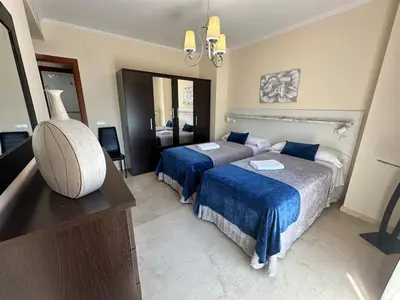 Cama o camas de una habitación en Piso en Linares zona Paseo con parking gratis