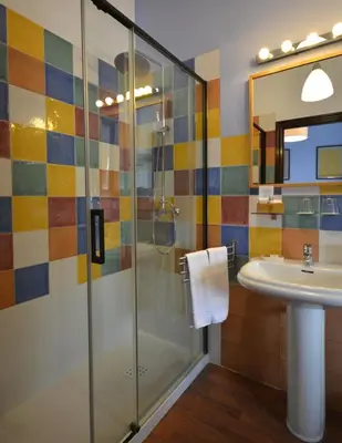 Un baño de Hotel Casa de los Azulejos