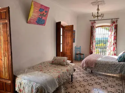 Cama o camas de una habitación en Bohemian Villa Malaga by PriorityVillas
