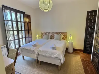 Cama o camas de una habitación en New! Your ultimate luxury finca with 11BR, Pool, Jacuzzi, Gym and Sauna just 30 minutes from Malaga!
