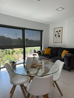 Zona de estar de Apartamento parking y piscina incluido