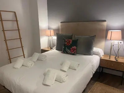 Cama o camas de una habitación en Mucho Trigo Apartments C