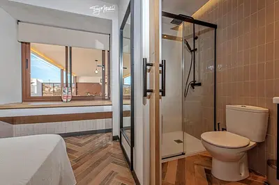 Un baño de La Cepa, Apartamentos la Cepa