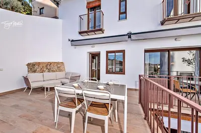 Un balcón o terraza de Sarmiento, Apartamentos la Cepa