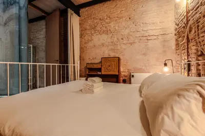 Cama o camas de una habitación en Encantador apartamento con patio en Macarena