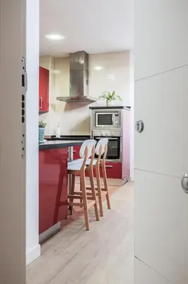 Una cocina o zona de cocina en Bonito ático en el centro con terraza