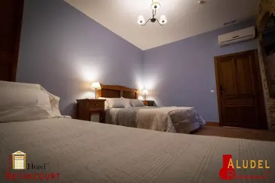 Cama o camas de una habitación en Hotel Casa Rural Betancourt