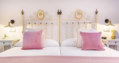 Cama o camas de una habitación en Patio de La Alameda