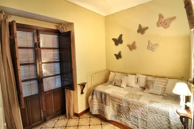 Cama o camas de una habitación en Adarve de los Olivares