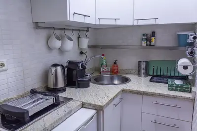 Una cocina o zona de cocina en CMApartamentos