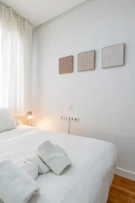 Cama o camas de una habitación en Loft Candela Apartment
