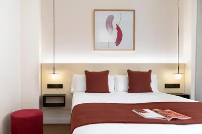Cama o camas de una habitación en Magno Apartments Clavellinas