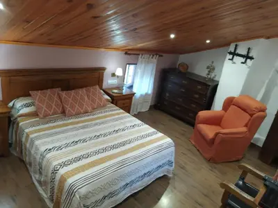 Cama o camas de una habitación en Mágina Dream Pegalajar Dormitorios disponibles según número huéspedes
