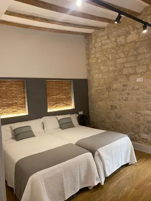 Cama o camas de una habitación en VELALMA -Edificio exclusivo de apartamentos turisticos en Centro histórico-JAEN